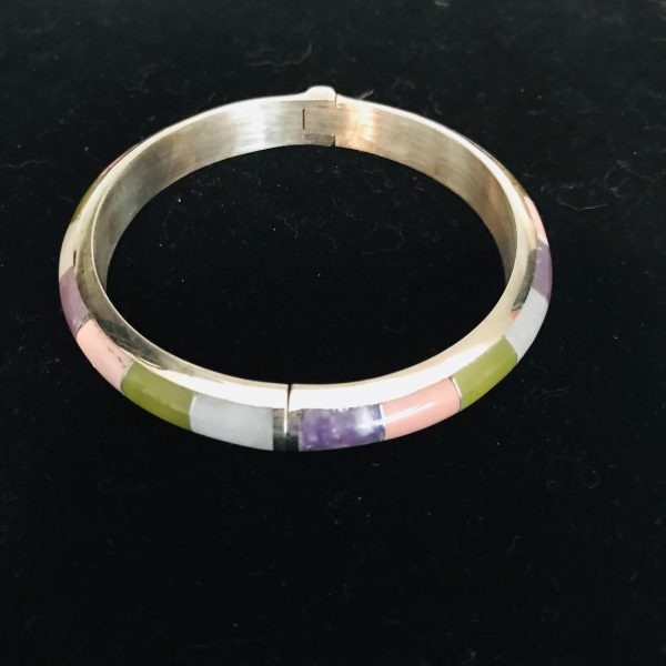 Vintage Sterling Silver jewelry bangle with inset polished stones 2 3/8" across opening spring clip closure