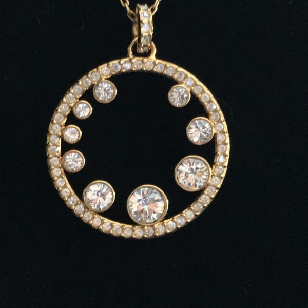 Vintage Swarovski Crystal Necklace Gold tone metal with large to small crystals surrounded wtih crystals with tiny crystal bail with swan