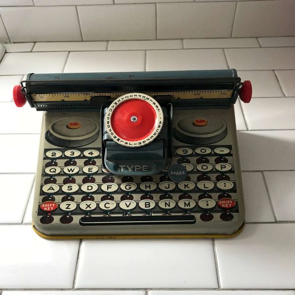 Vintage toy typewriter Tin Litho pretend play moving parts collectible display toy Uneek Artie USA NJ & NY Unique "Dependable" typewriter