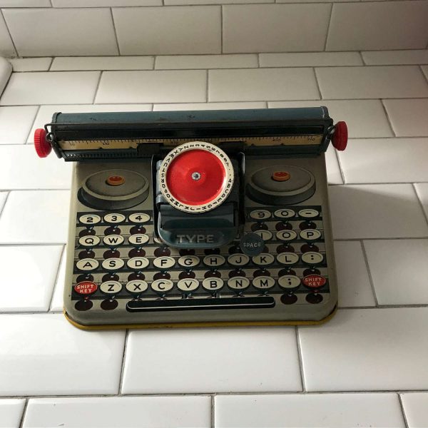 Vintage toy typewriter Tin Litho pretend play moving parts collectible display toy Uneek Artie USA NJ & NY Unique "Dependable" typewriter