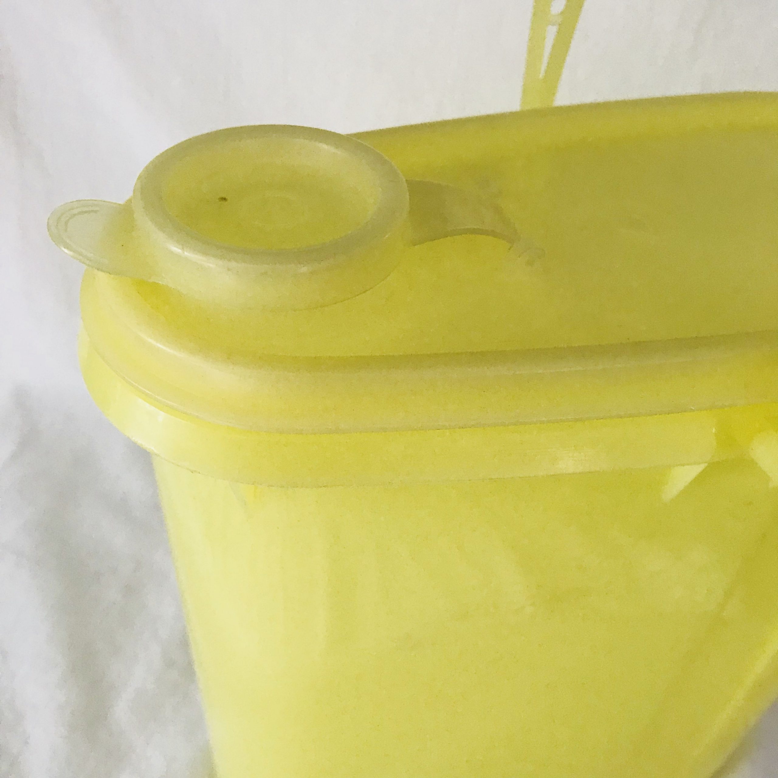 https://www.truevintageantiques.com/wp-content/uploads/2019/12/vintage-tupperware-refrigerator-container-pitcher-koolaid-iced-tea-water-2-quart-buddy-pitcher-with-flip-top-picnic-summer-outdoor-patio-5e02d1a23-scaled.jpg