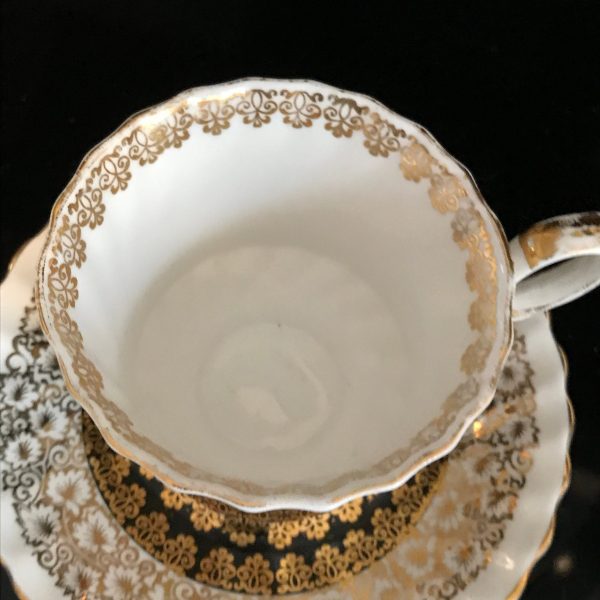 Queen Anne tea cup and saucer England Fine bone china Black with heavy gold trim farmhouse collectible display
