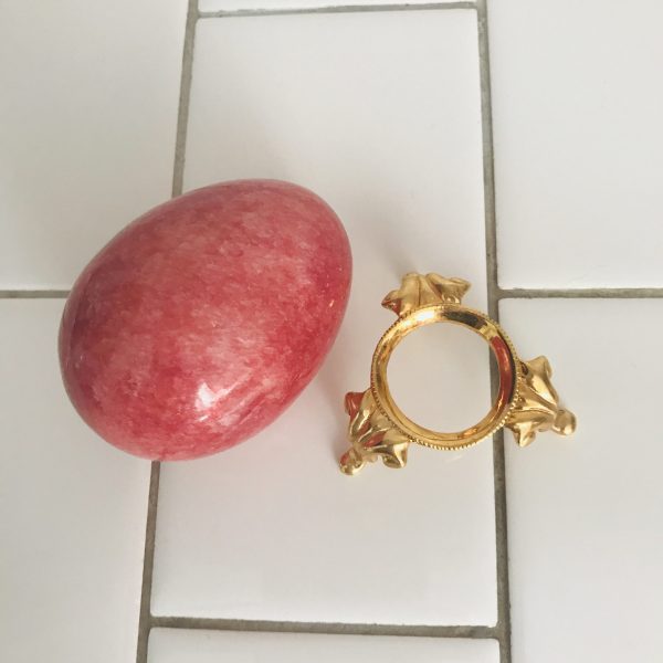 Beautiful dark pink agate egg figurine on gold metal stand great coloring display collectible vintage home decor Easter farmhouse cottage