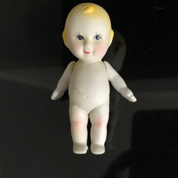 Vintage Kewpie doll with moveable arms miniature bisque detailed coloring farmhouse collectible display retro decor