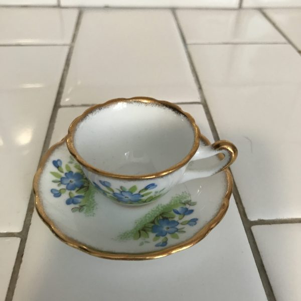 Vintage miniature tea cup and saucer Salisbury England fine bone china blue flowers farmhouse bed and breakfast trinket collectible