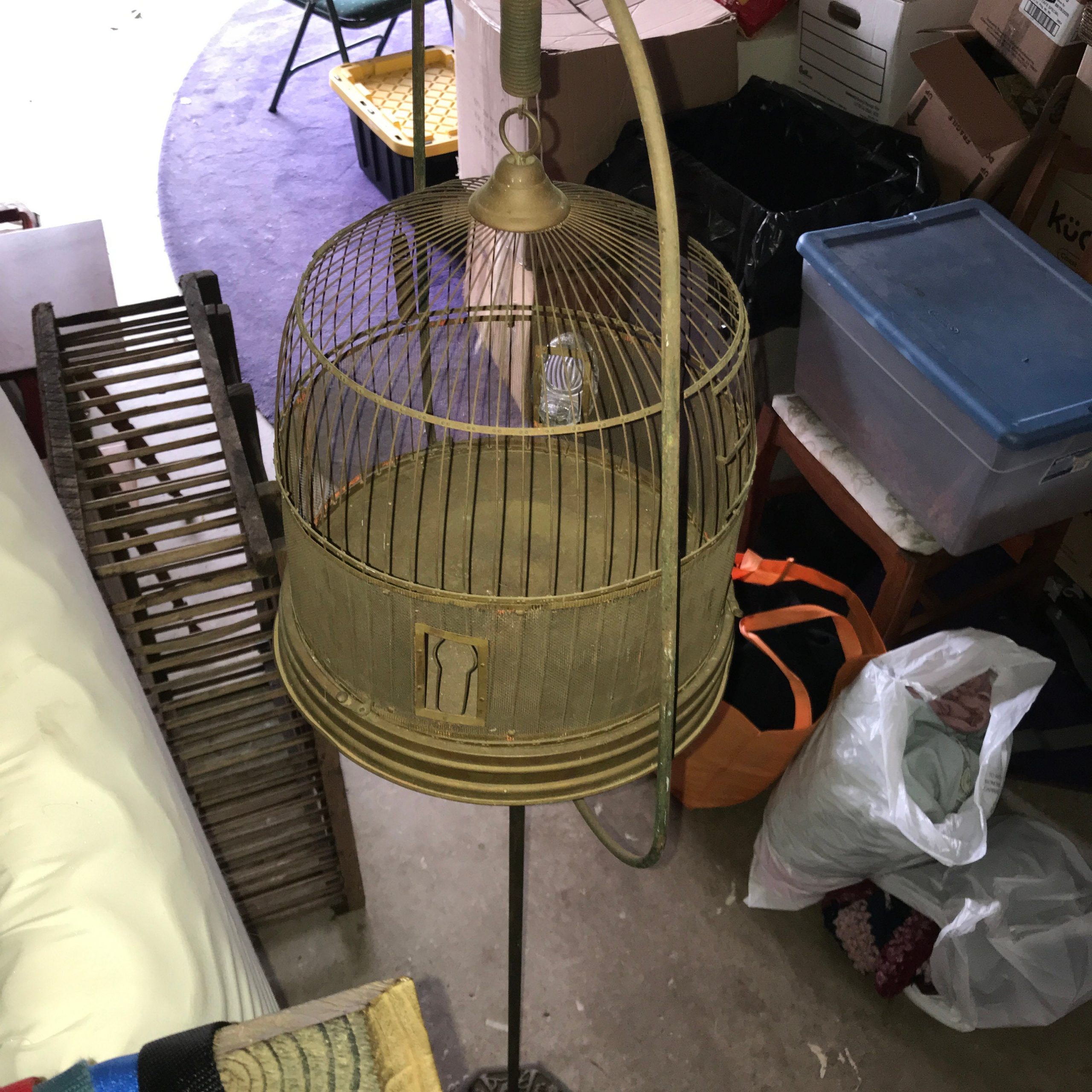 https://www.truevintageantiques.com/wp-content/uploads/2020/04/vintage-bird-cage-hanging-cage-brass-with-original-patina-farmhouse-collectible-cottage-cast-iron-stand-1-glass-food-water-dish-home-decor-5ea21f5f10-scaled.jpg