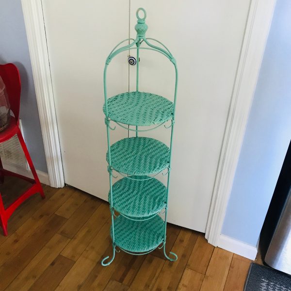 A very pretty Jade blue plate rack or Pie rack vintage collectible display rack 46" tall wicker and metal