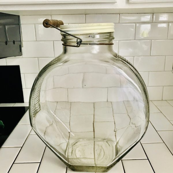 Antique Giant Drugstore jar Kitchen Storage ribbed glass metal lid wire handle with wood top collectibles display apothecary tv movie prop