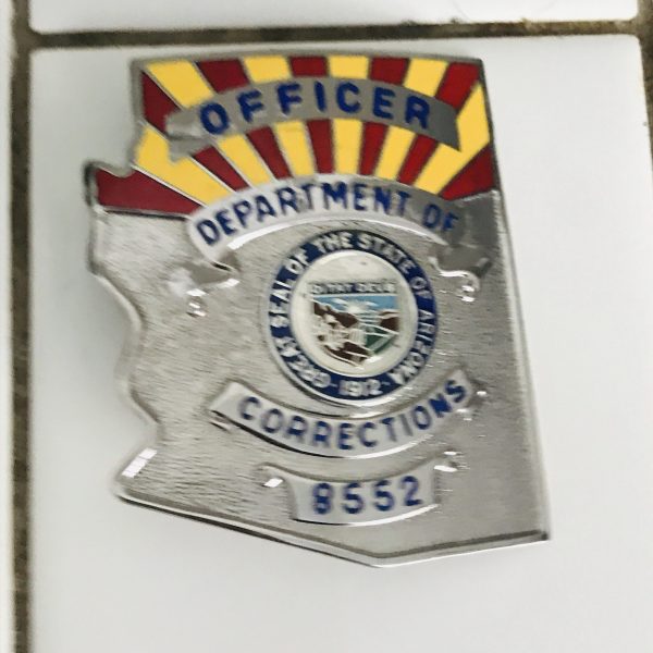 Obsolete Badge Officer Department of Corrections Arizona #8552 silver with red & yellow enamel collectible display memorabilia