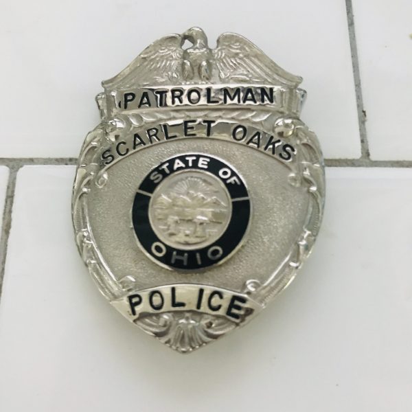Obsolete Badge Patrolman Scarlet Oaks Police State of Ohio black enameled center silver with black collectible memorabilia