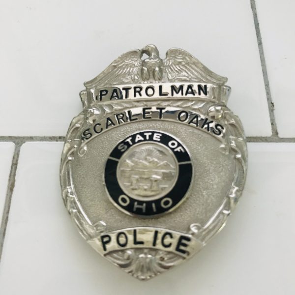 Obsolete Badge Patrolman Scarlet Oaks Police State of Ohio black enameled center silver with black collectible memorabilia