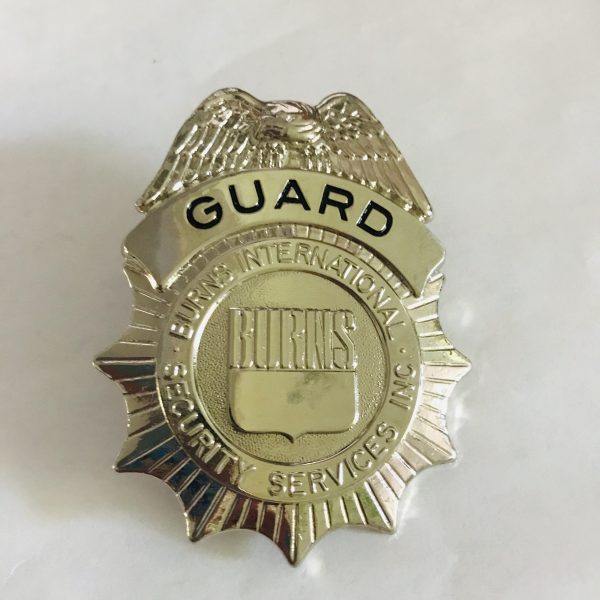 Obsolete Guard Badge Burns International Security Services collectible memorabilia display silver tone with blue