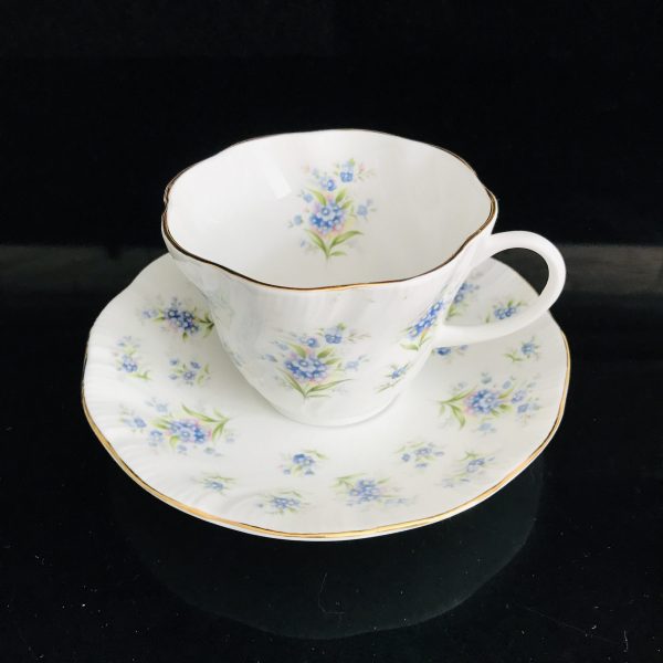 Queen's tea cup and saucer Staffordshire England Fine bone china blue and lavender forget-me-not collectible display cottage lodge coffee