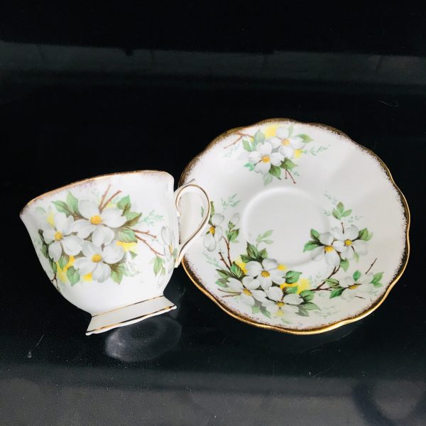 Royal Albert tea cup and saucer England Fine bone china White Dogwood yellow centers green leaves  farmhouse collectible display coffee