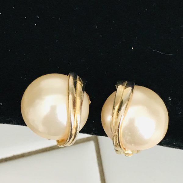 Vintage Gold tone earrings with gold tone double half moon trim on large faux pearls