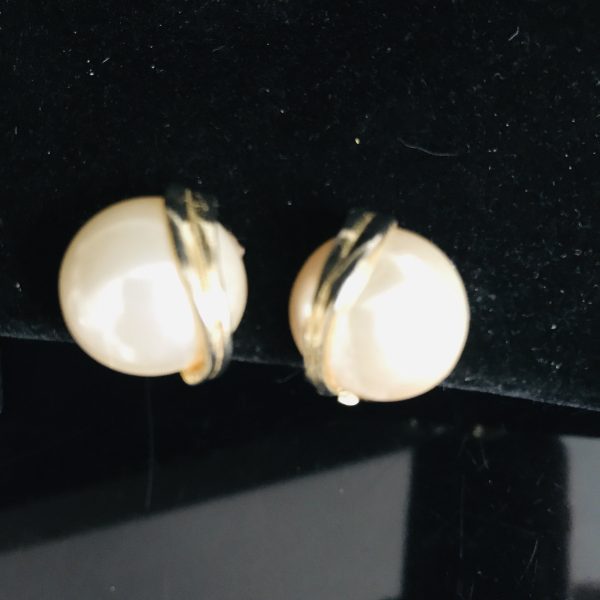 Vintage Gold tone earrings with gold tone double half moon trim on large faux pearls
