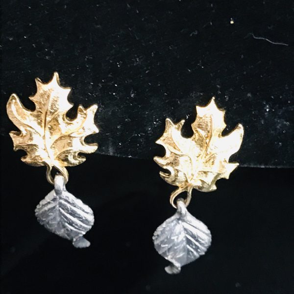 Vintage Leaf pattern clip earrings gold and silver tone signed Avon dangle silver leaf