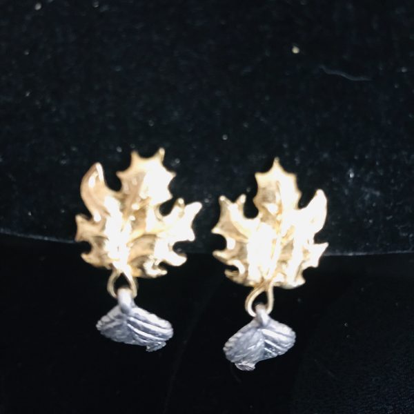 Vintage Leaf pattern clip earrings gold and silver tone signed Avon dangle silver leaf