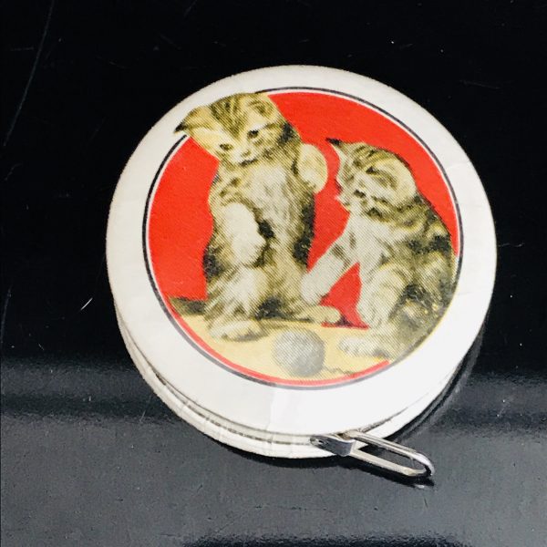 Vintage Sewing Notions 1950's Kitten Tape measure collectible display metal with yellow cloth measurer MINT condition round