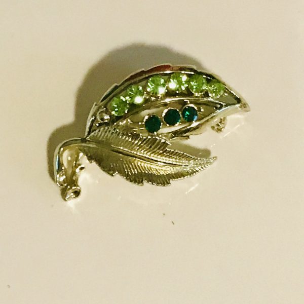 Vintage Leaf Rhinestone Brooch Pin set in gold tone metal emerald color and light green rhinestones