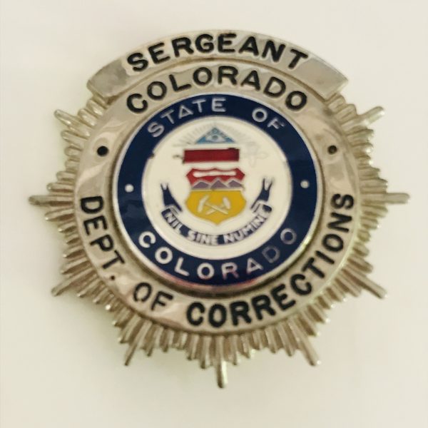 Obsolete Badge Department of Corrections Sergeant Colorado collectible memorabilia metal signed Blackinton silver with blue