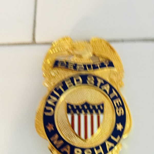Obsolete Badge Deputy United States Marshal Gold with red white and blue enamel collectible display memorabilia gold full size