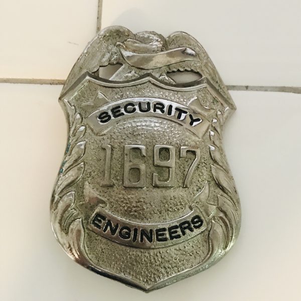 Obsolete Department of State Security Engineers Badge 1697 collectible memorabilia display silver  tone with black #1697