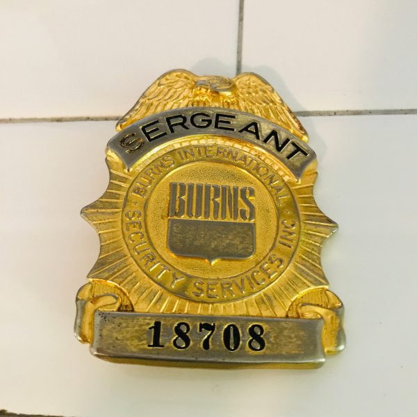 Obsolete Guard Badge Burns International Security Services #18708 collectible memorabilia display gold tone with blue