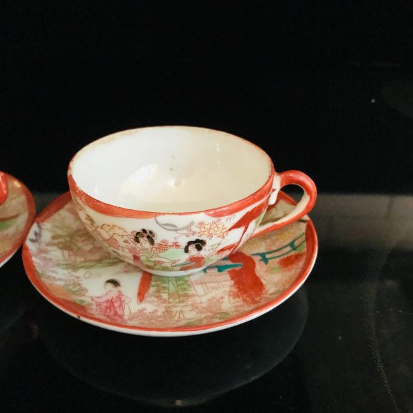 Antique Japanese demitasse tea cup and saucers red paint and fine bone china Collectible display Asian design