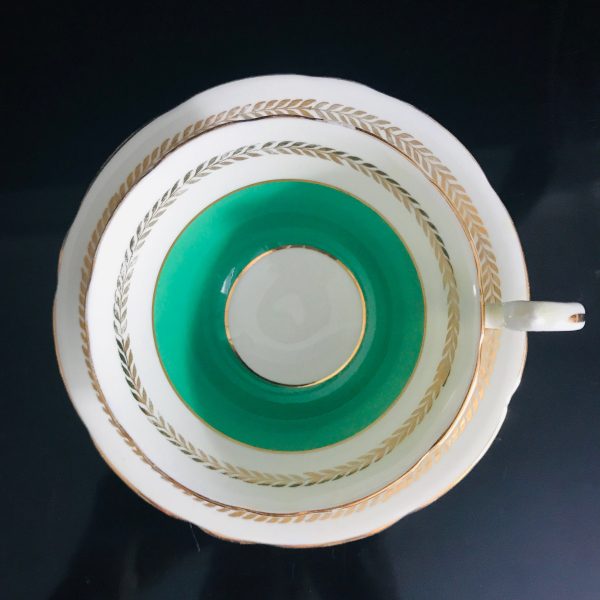 Tea cup and saucer Aynsley England Fine bone china green rim gold trim farmhouse collectible display coffee bridal