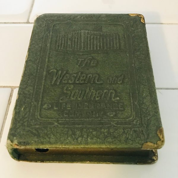 Vintage book bank made for storing money in a secret way metal with lock leather binding The Western and Southern Life insurance company