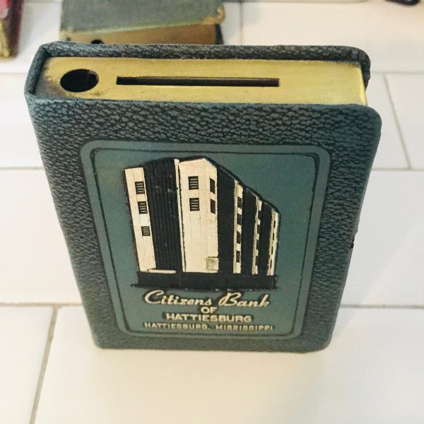 Vintage locking book bank made for storing money in a secret way metal with lock and leather binding Citizens Bank  Hattiesburg Mississippi
