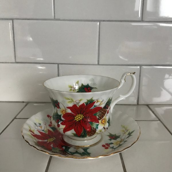 Royal Albert tea cup and saucer England Fine bone china Poinsettia Christmas farmhouse collectible display coffee serving