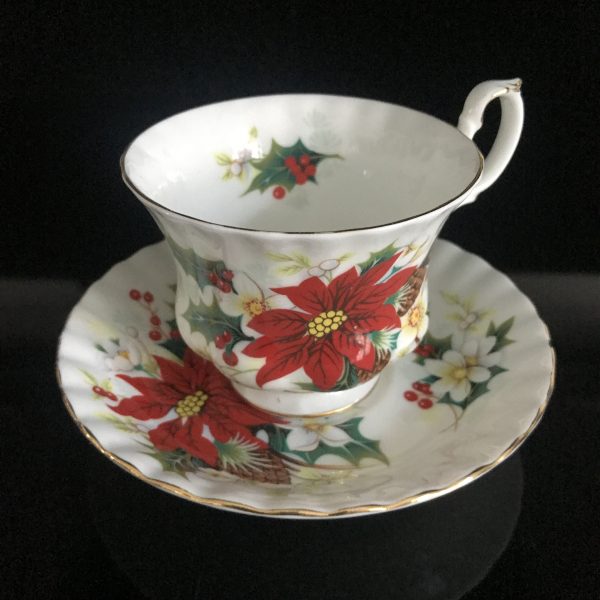 Royal Albert tea cup and saucer England Fine bone china Poinsettia Christmas farmhouse collectible display coffee serving
