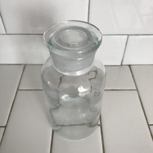 Vintage apothecary jar medical collectible ground glass stopper TCW Co. USA clear farmhouse primitive rustic medical pharmiceutical bottle
