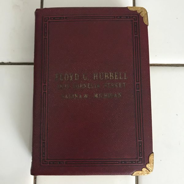Vintage locking book bank made for storing money in a secret way metal with lock and leather binding Floyd G. Hubbell 1632 Cornella St Mich