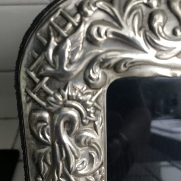 Beautiful sterling silver ornate picture frame birds, scrolls and leaves and a greek god at the bottom