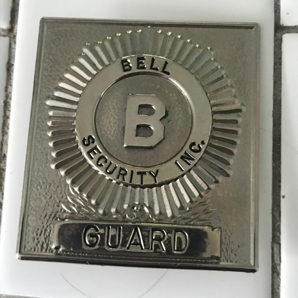 Obsolete Guard Badge Bell Security Inc. collectible memorabilia display silver tone with blue