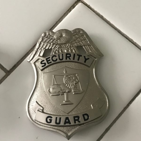 Obsolete Guard Badge Security collectible memorabilia display silver tone with blue Lion and Scales of Justice Center 911 Emergency badge