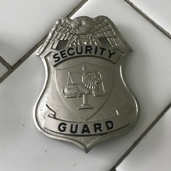 Obsolete Guard Badge Security collectible memorabilia display silver tone with blue Lion and Scales of Justice Center 911 Emergency badge