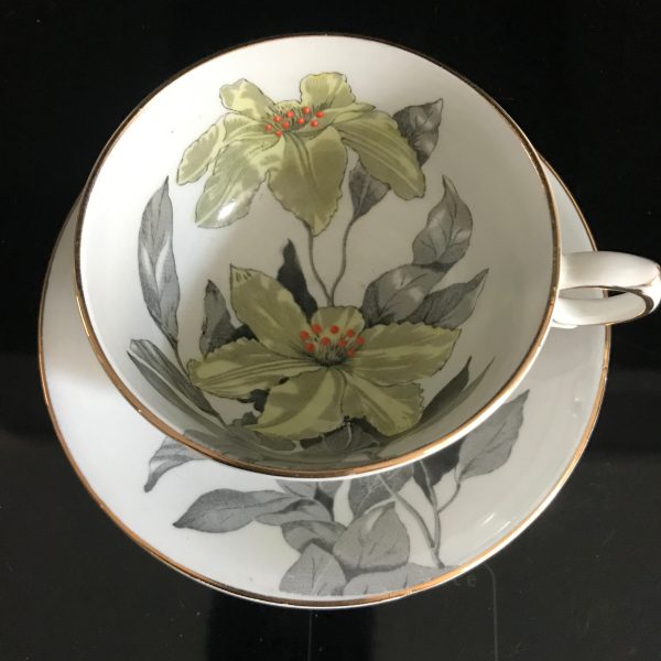 Clarence Windsor tea cup and saucer England Fine bone china Green & Orange Trillium gray leaves gold trim farmhouse collectible display