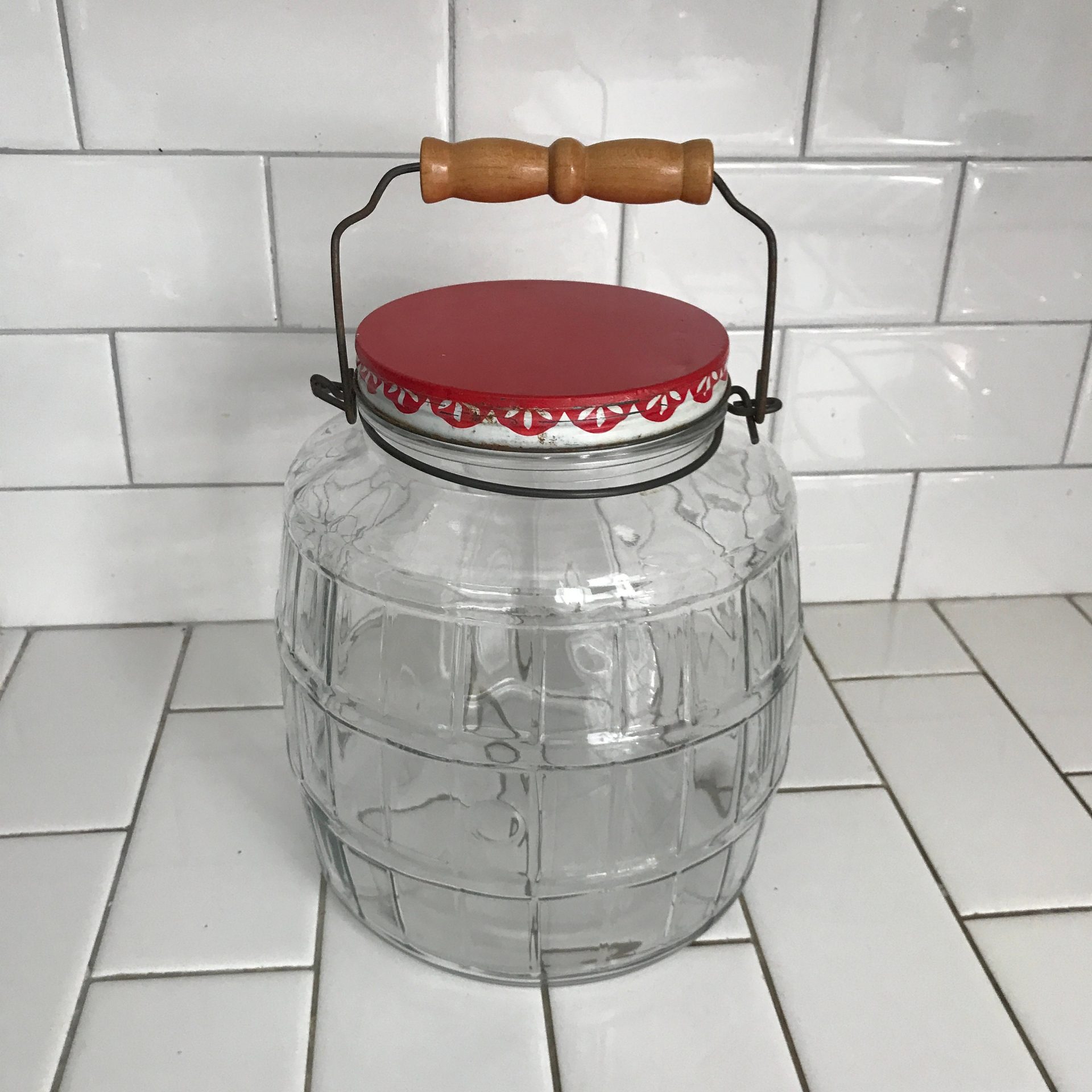 https://www.truevintageantiques.com/wp-content/uploads/2022/05/vintage-glass-kitchen-storage-jar-bottle-canister-drugstore-pickle-jar-collectible-farmhouse-display-marbles-buttons-dog-treats-display-jar-629177661-scaled.jpg